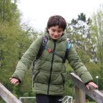 Smiling student during an outdoor activity at The Loddon School